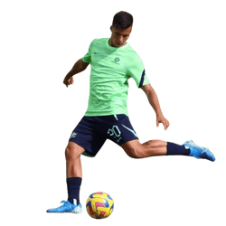 Jaden striking a football in a training kit